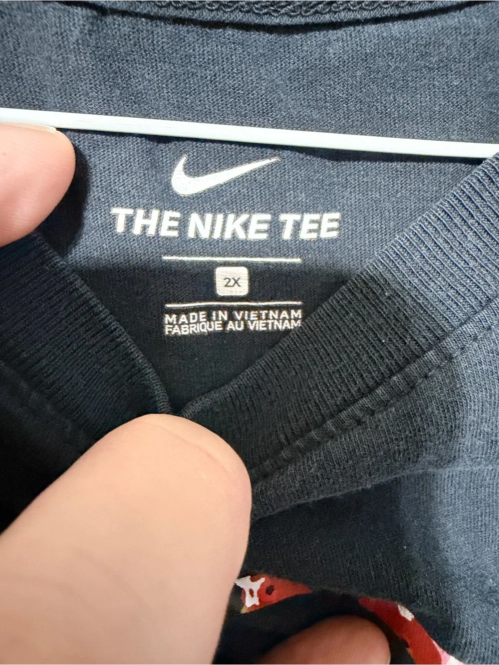 Nike Black Short-Sleeve Logo Tee with Floral Oval